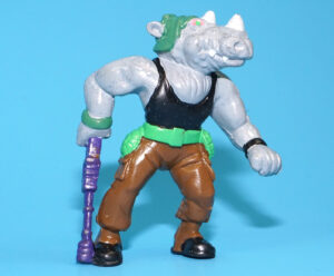 TMNT TEENAGE MUTANT NINJA TURTLES PVC TOY FIGURE ROCKSTEADY 1990 YOLANDA