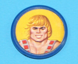 MOTU HE-MAN MASTERS OF THE UNIVERSE ORIGINAL SPARE PART ORKO COIN HE-MAN HONG KONG 1984 MATTEL