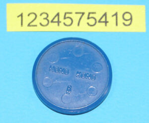 MOTU HE-MAN MASTERS OF THE UNIVERSE ORIGINAL SPARE PART ORKO COIN MAN-AT-ARMS HONG KONG 1984 MATTEL